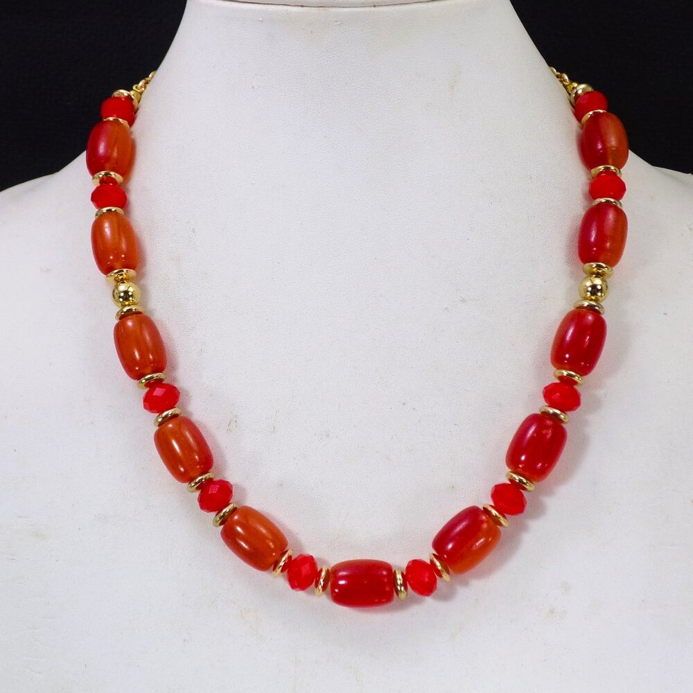 Orange and red vibrant color bead necklace with gold plated beads.